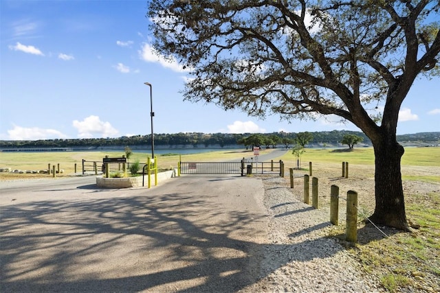 view of community with a water view