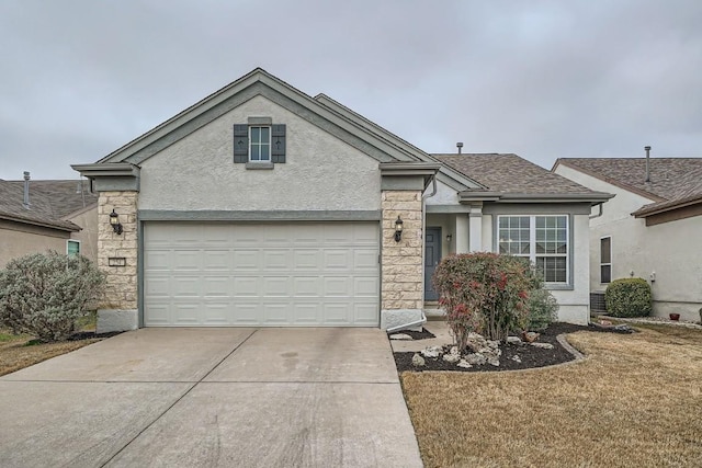 view of front of house with a garage and a front yard