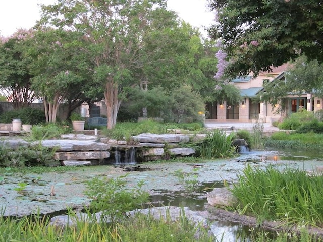 254 Monument Hill Trl, Georgetown, TX 78633 - view of yard featuring a garden pond