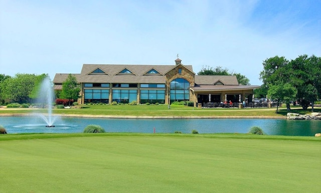 254 Monument Hill Trl, Georgetown, TX 78633 - view of community featuring a yard, a water view, and golf course view