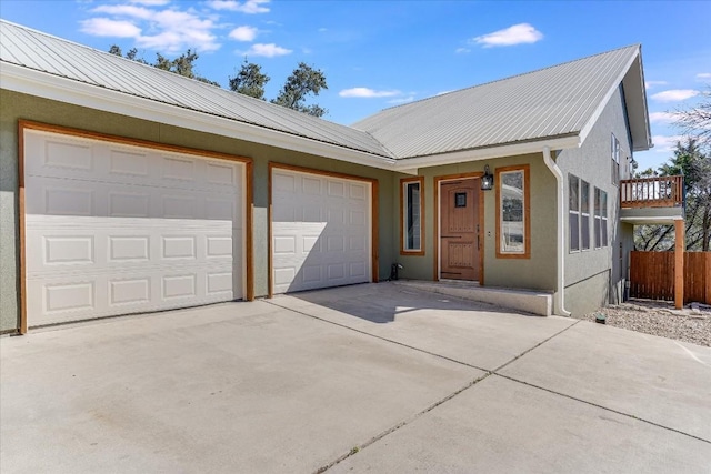 ranch-style home featuring a garage