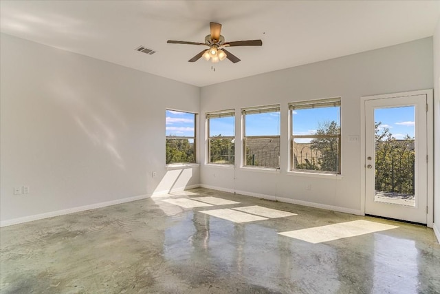 unfurnished room with ceiling fan