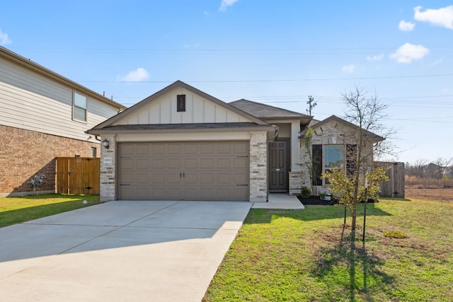 view of front facade featuring a garage and a front lawn