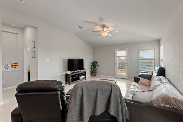 tiled living room featuring vaulted ceiling and ceiling fan