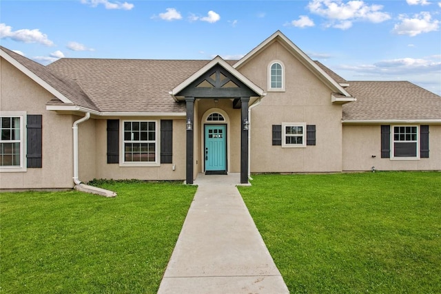 view of front of house with a front lawn