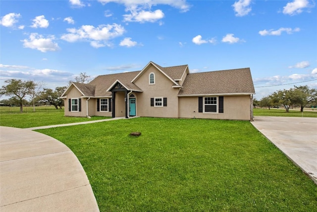 single story home with a front yard