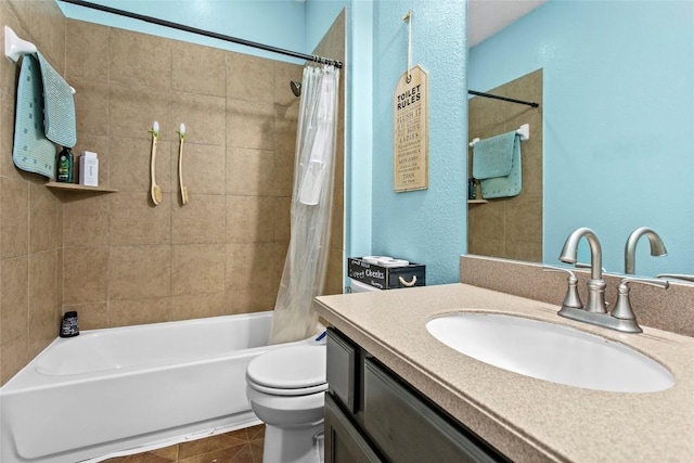 full bathroom featuring shower / tub combo, vanity, tile patterned floors, and toilet