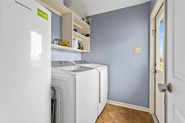 laundry room with washing machine and dryer