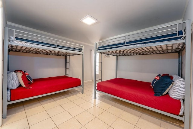 bedroom featuring tile patterned flooring