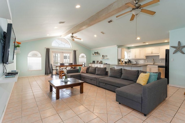 tiled living room featuring vaulted ceiling with beams, crown molding, sink, and ceiling fan