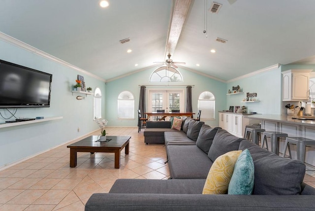 tiled living room with french doors, ceiling fan, ornamental molding, and vaulted ceiling with beams