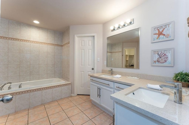 bathroom featuring vanity, tile patterned floors, and independent shower and bath