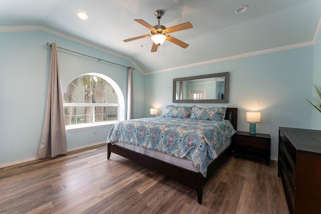 bedroom with lofted ceiling, hardwood / wood-style flooring, and ornamental molding