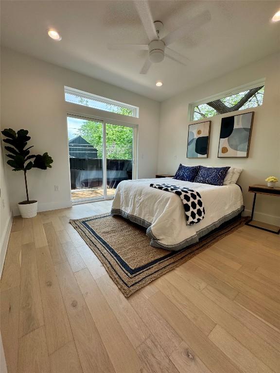 1708 Canterbury St Unit 2, Austin, TX 78702 - bedroom with access to exterior, hardwood / wood-style floors, recessed lighting, baseboards, and a ceiling fan