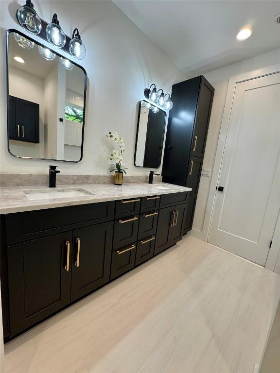 1708 Canterbury St Unit 2, Austin, TX 78702 - bathroom with double vanity and recessed lighting