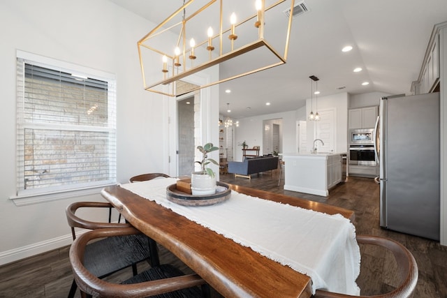 513 Elworth Path, Lakeway, TX 78738 - dining room with dark wood-style flooring, baseboards, plenty of natural light, a chandelier, and recessed lighting