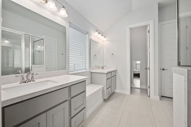 513 Elworth Path, Lakeway, TX 78738 - full bathroom featuring two vanities, lofted ceiling, tile patterned floors, an enclosed shower, and plenty of natural light