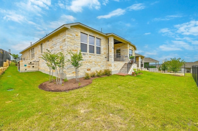 513 Elworth Path, Lakeway, TX 78738 - rear view of house with stone siding and stairway