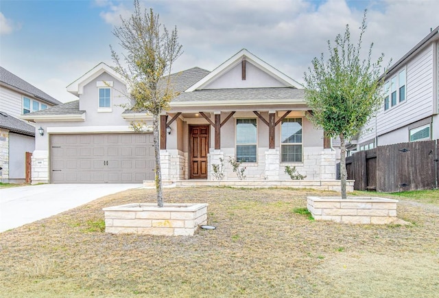 view of front of house with a garage and a front yard