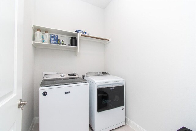 laundry area with washer and dryer