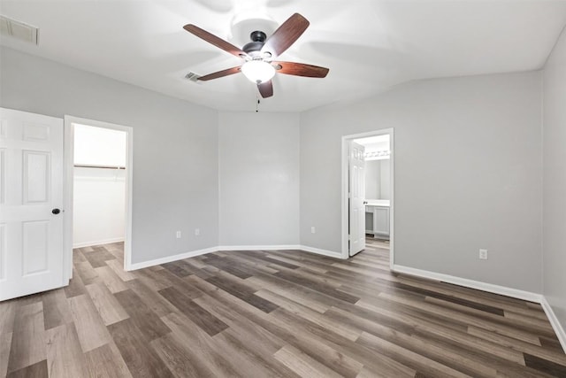 interior space featuring ceiling fan and dark hardwood / wood-style flooring