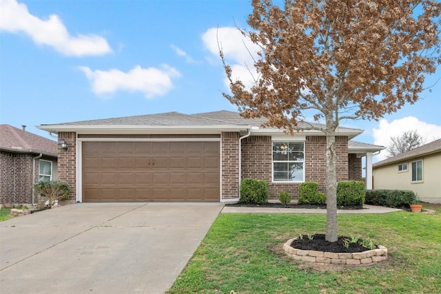 ranch-style house featuring a garage and a front lawn