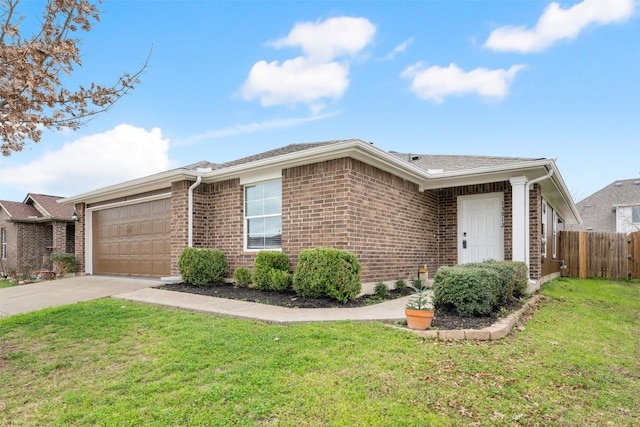 single story home featuring a garage and a front yard