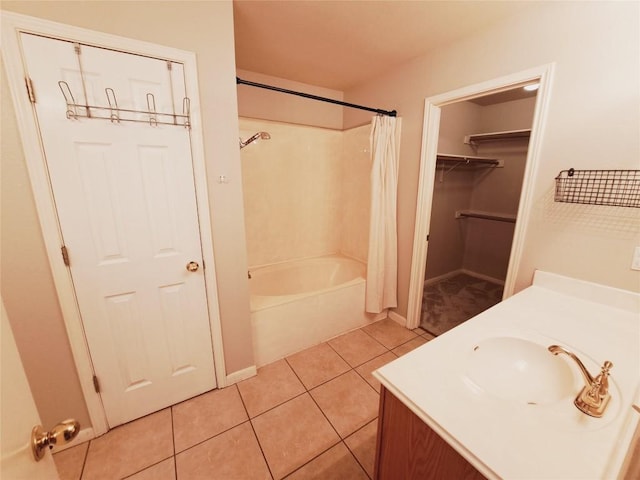 bathroom with shower / tub combo with curtain, vanity, and tile patterned floors