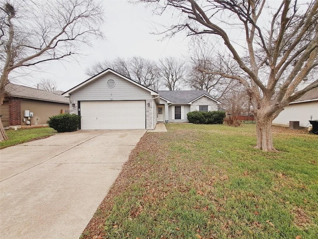 single story home with cooling unit, a garage, and a front yard