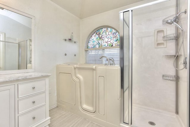 2718 Summerwalk Pl, Round Rock, TX 78665 - full bathroom featuring a shower stall, vanity, and a bath