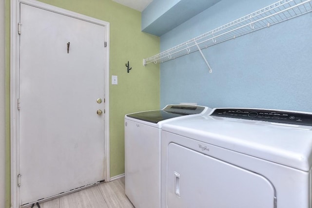 2718 Summerwalk Pl, Round Rock, TX 78665 - laundry area featuring light wood-style flooring and independent washer and dryer