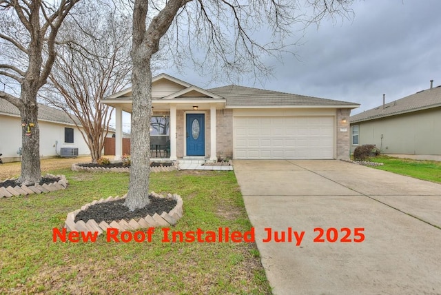 2718 Summerwalk Pl, Round Rock, TX 78665 - single story home featuring an attached garage, a front lawn, concrete driveway, a porch, and brick siding