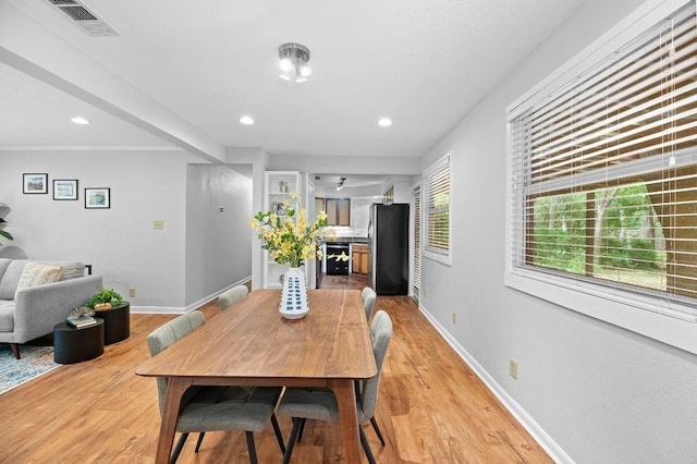 dining room featuring light wood-type flooring