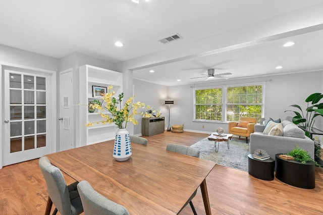 dining room featuring ceiling fan and light hardwood / wood-style floors