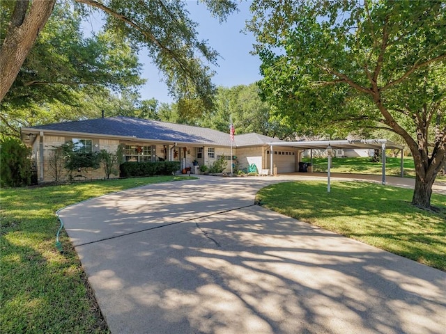 ranch-style home with a garage and a front lawn