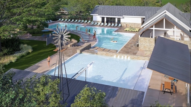 view of pool featuring a patio area