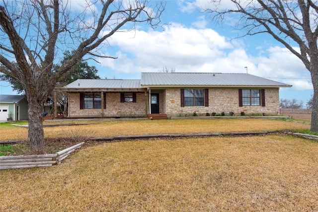 ranch-style home with a front lawn