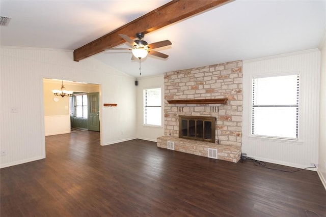 unfurnished living room featuring lofted ceiling with beams, a stone fireplace, dark wood-type flooring, and ceiling fan with notable chandelier