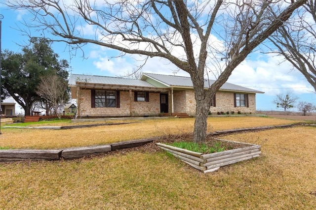 ranch-style house with a front lawn