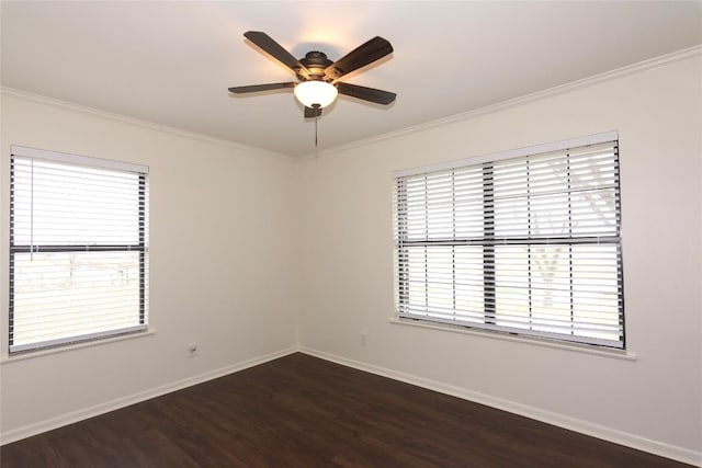 unfurnished room with dark wood-type flooring, ceiling fan, and ornamental molding