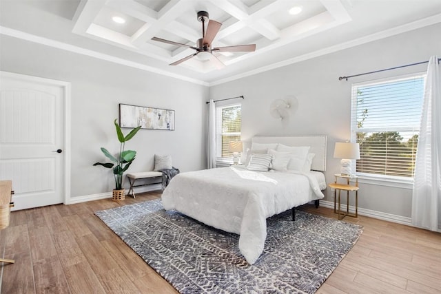 bedroom featuring crown molding, ceiling fan, coffered ceiling, and light hardwood / wood-style floors