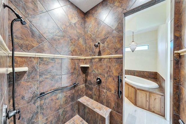 3701 Copper Ridge Ct, Austin, TX 78734 - bathroom featuring a garden tub and tiled shower