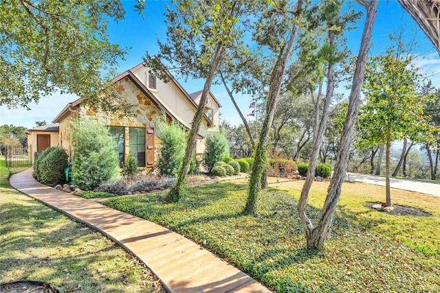 3701 Copper Ridge Ct, Austin, TX 78734 - view of side of property with stone siding and stucco siding