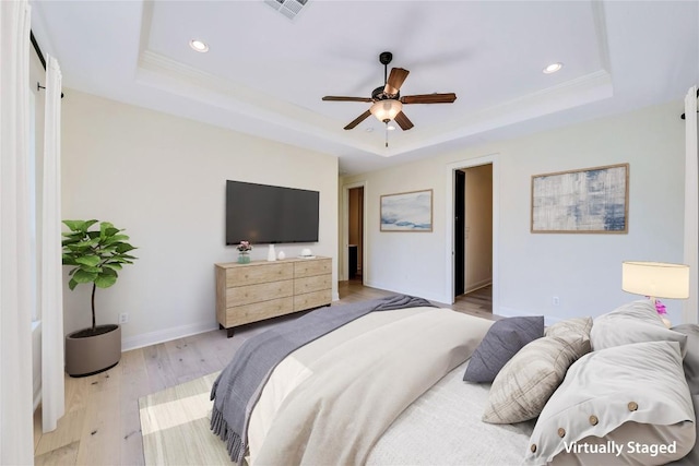 3701 Copper Ridge Ct, Austin, TX 78734 - bedroom featuring a tray ceiling, light wood-style floors, recessed lighting, baseboards, and ceiling fan