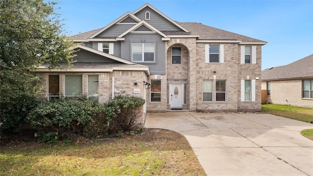 view of front facade with a front lawn