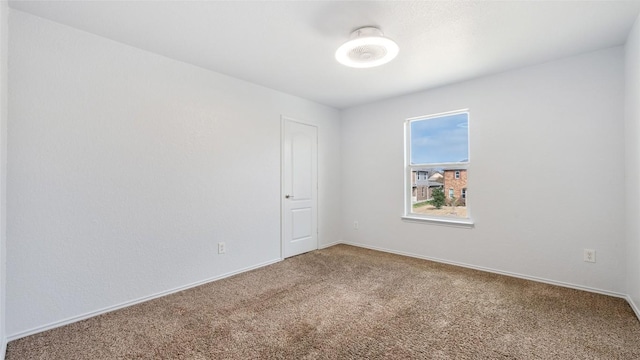 view of carpeted spare room