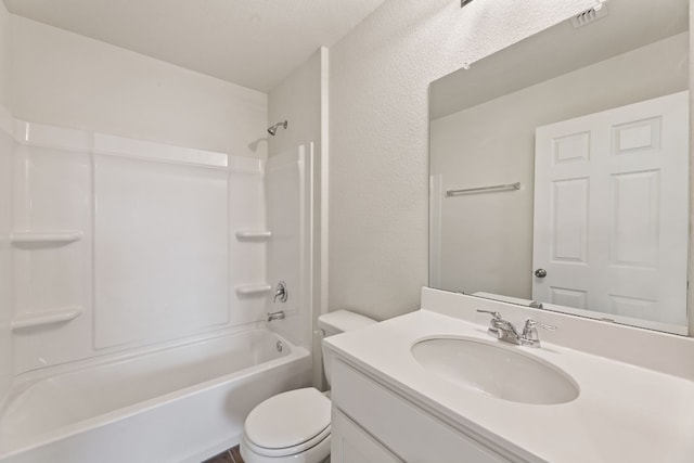 full bathroom with shower / tub combination, vanity, and toilet