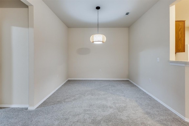 empty room featuring carpet floors