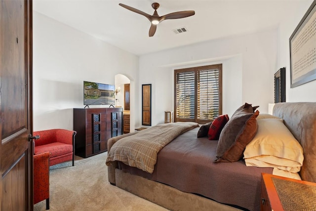 carpeted bedroom with ceiling fan