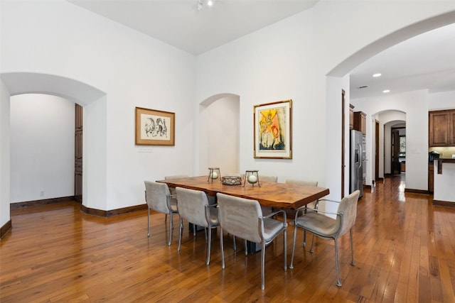 dining room featuring dark hardwood / wood-style flooring